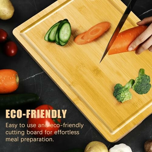 Person cutting vegetables on an eco-friendly cutting board