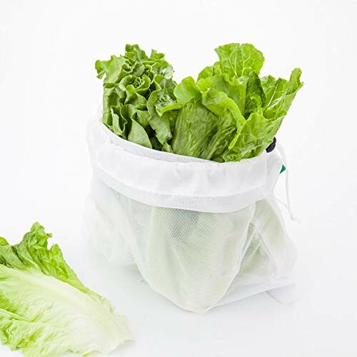 Lettuce leaves in a white mesh bag