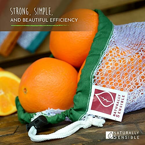 Oranges in a mesh produce bag with Naturally Sensible logo.