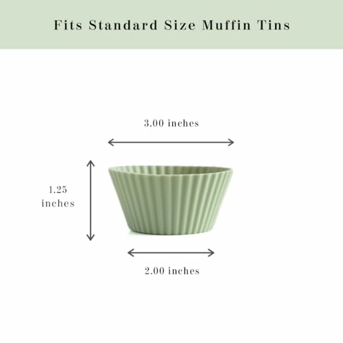 Green silicone muffin cup with measurements for standard size muffin tins.